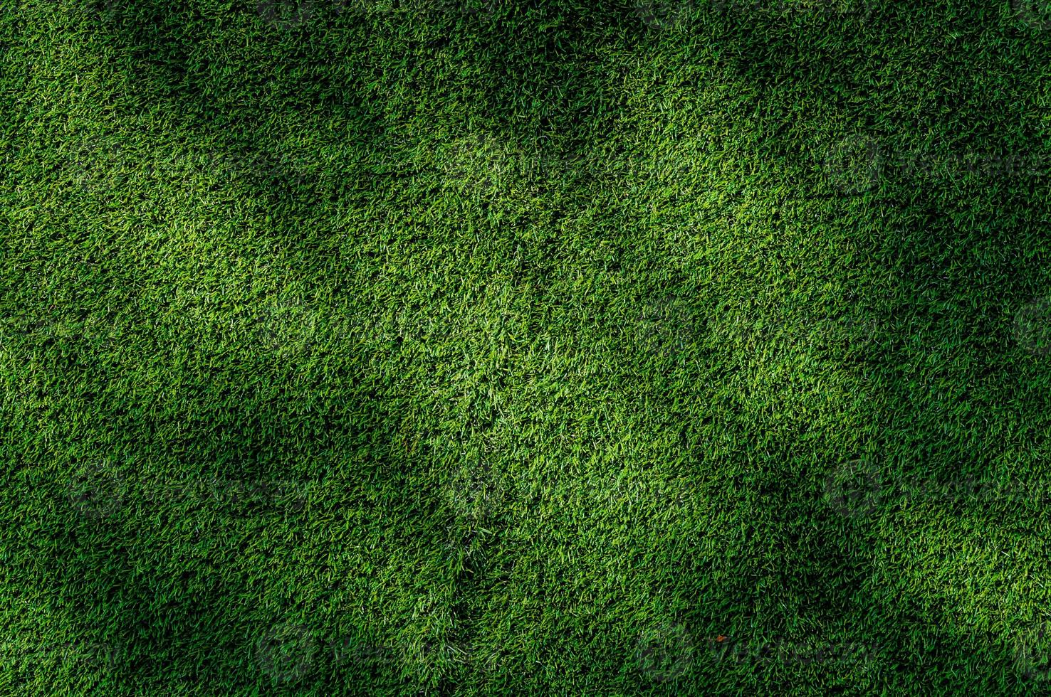 Abstract  top view green color of artificial grass background texture photo