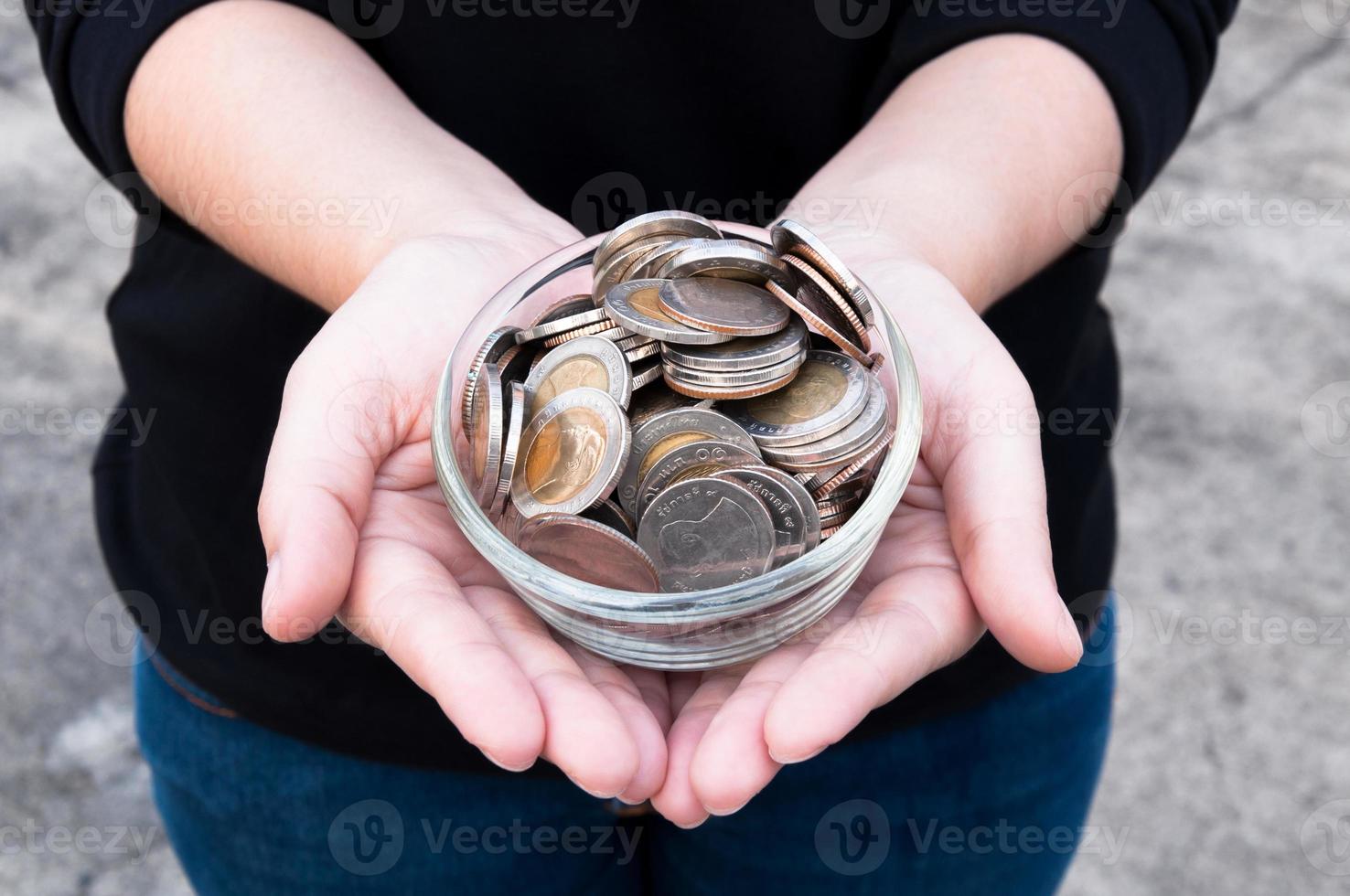 Coins in hands saving,Donation Investment Fund Financial Support Charity  Dividend Market  House Stock Trust Wealthy Giving Planned Accounting Collection Debt Banking ROI photo