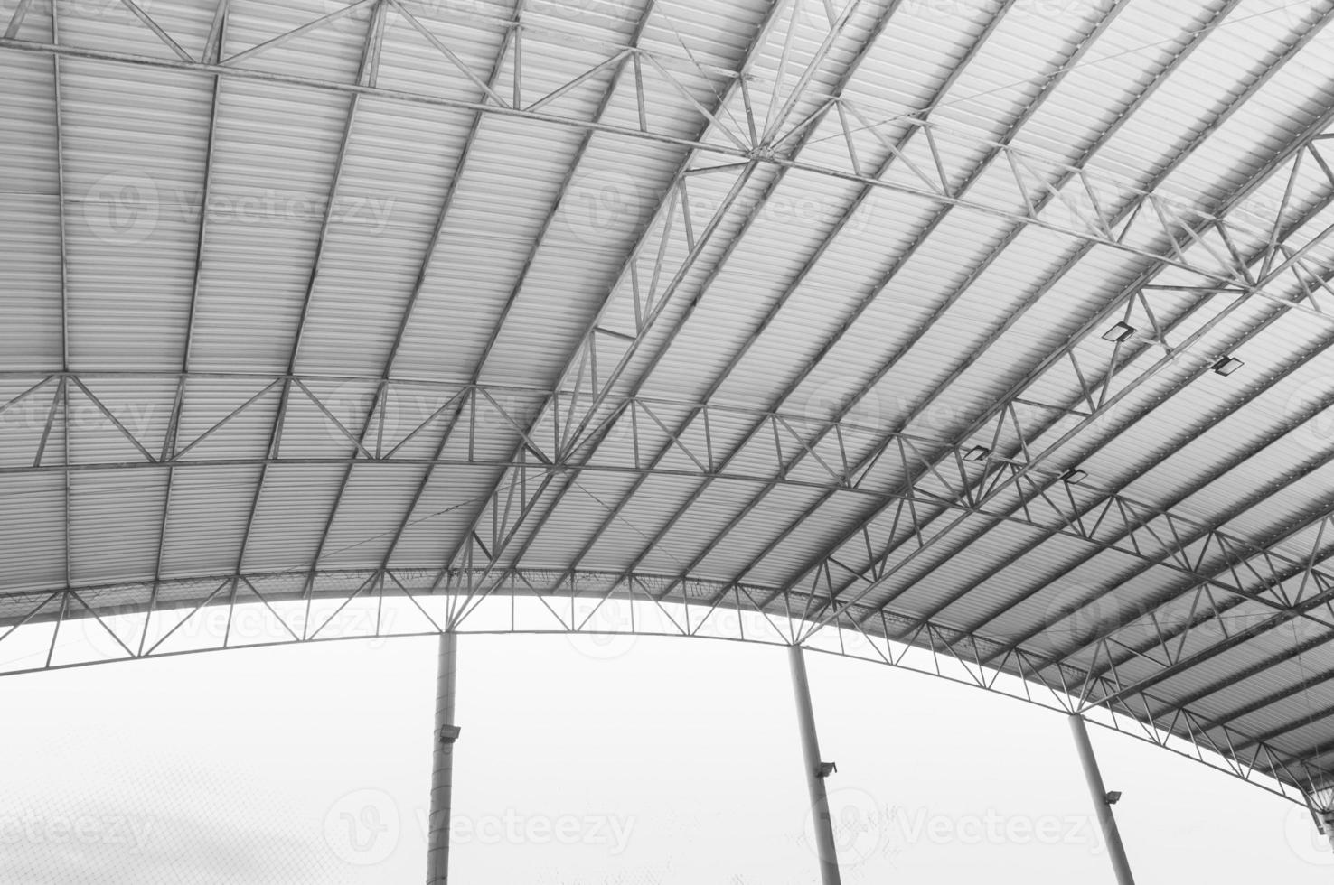 Steel structure Roof detail ,Indoor empty warehouse factory ,Curve line Steel structure Detail of Metal roof construction photo