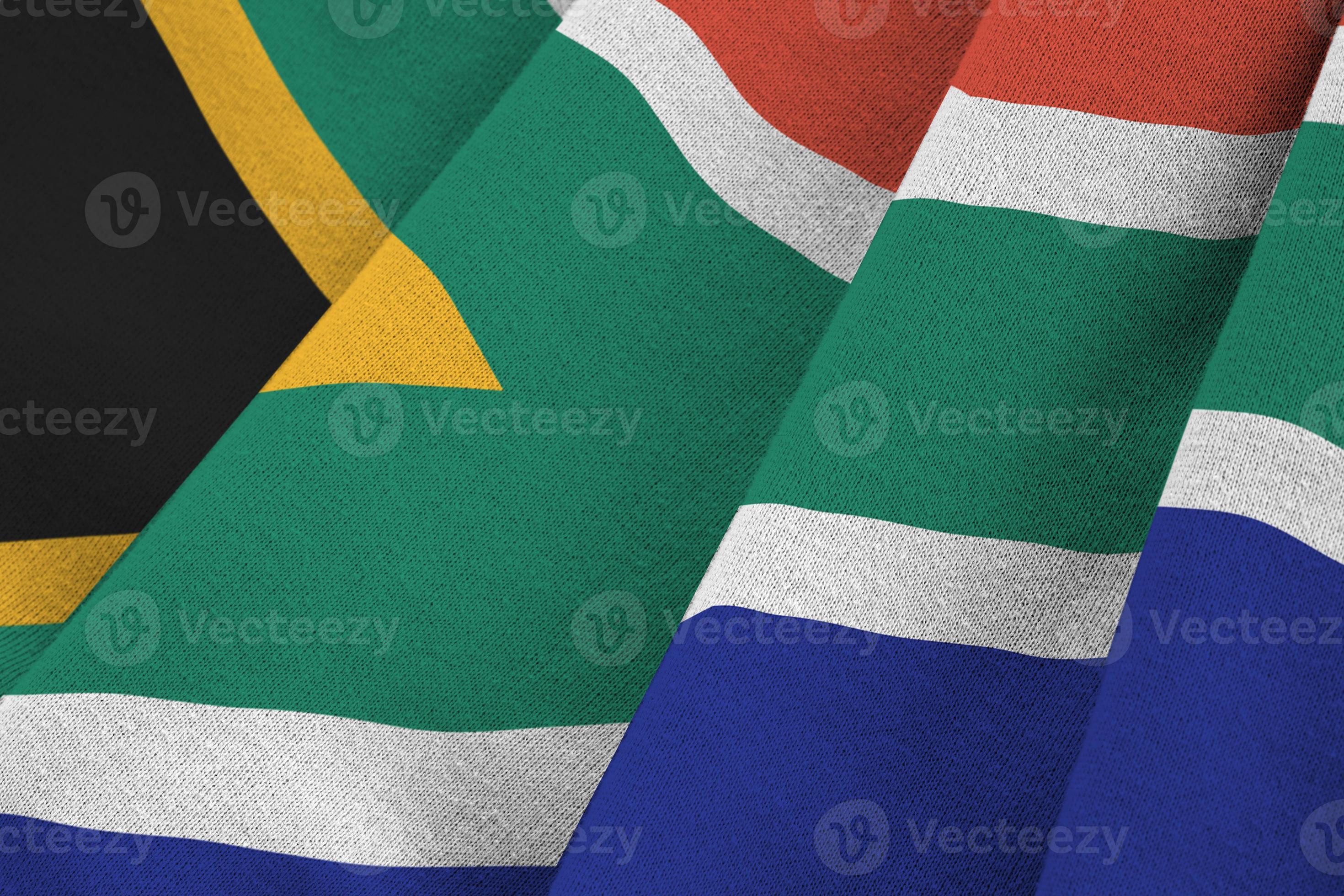South Africa flag with big folds waving close up under the studio light