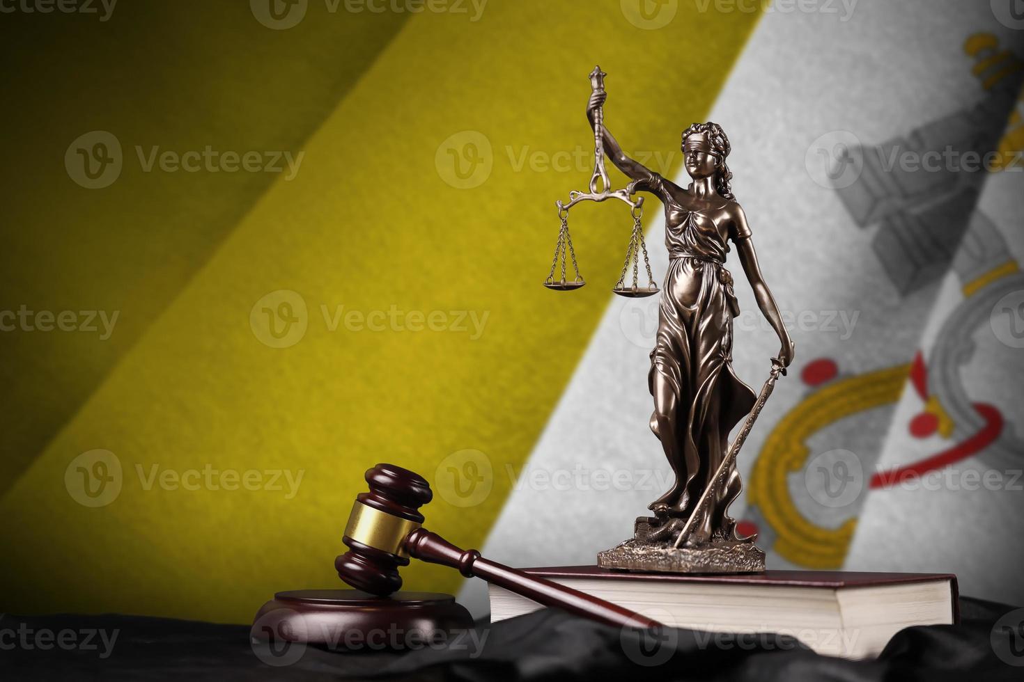 Vatican City State flag with statue of lady justice, constitution and judge hammer on black drapery. Concept of judgement and guilt photo