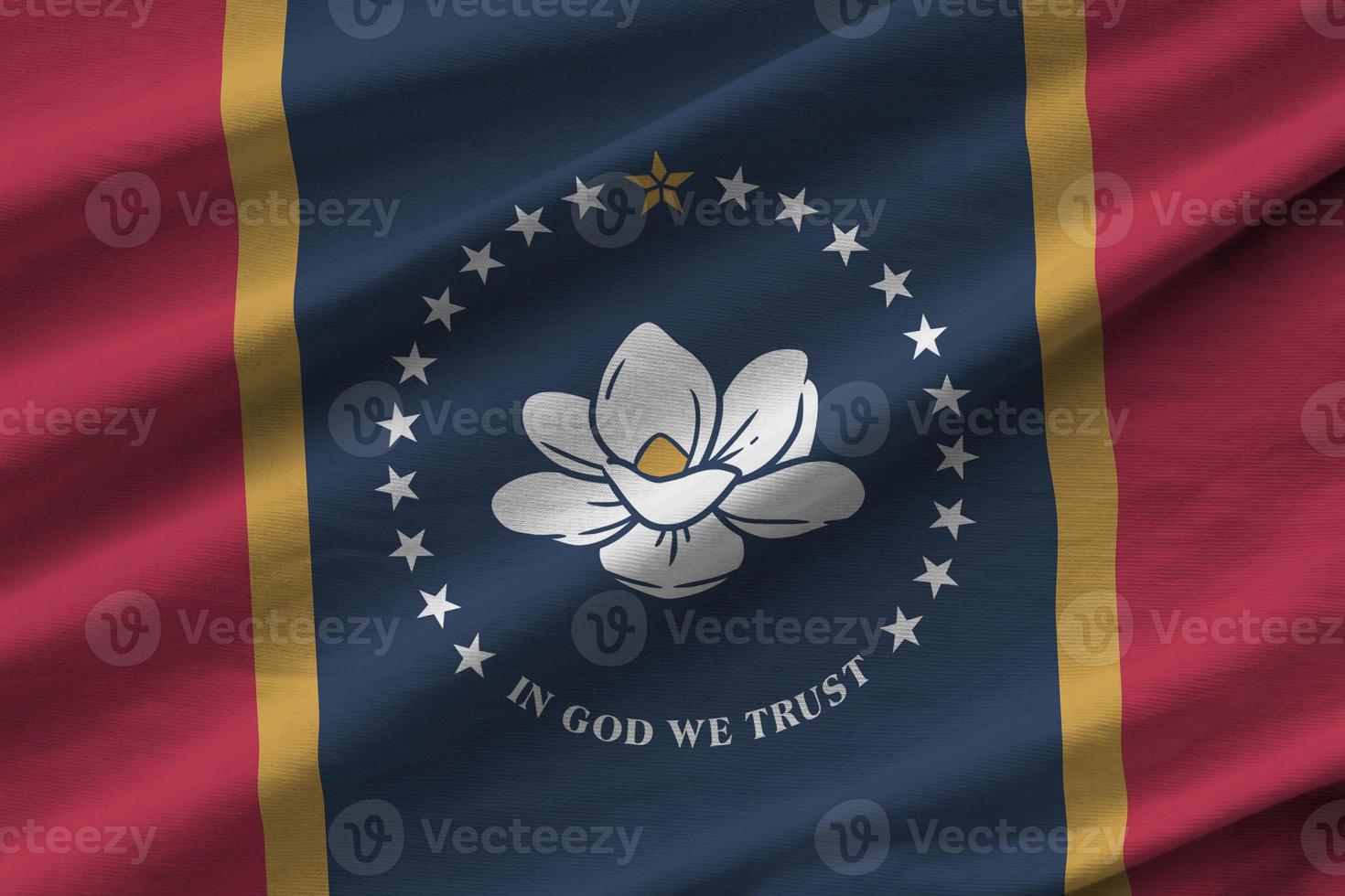 Mississippi new US state flag with big folds waving close up under the studio light indoors. The official symbols and colors in banner photo