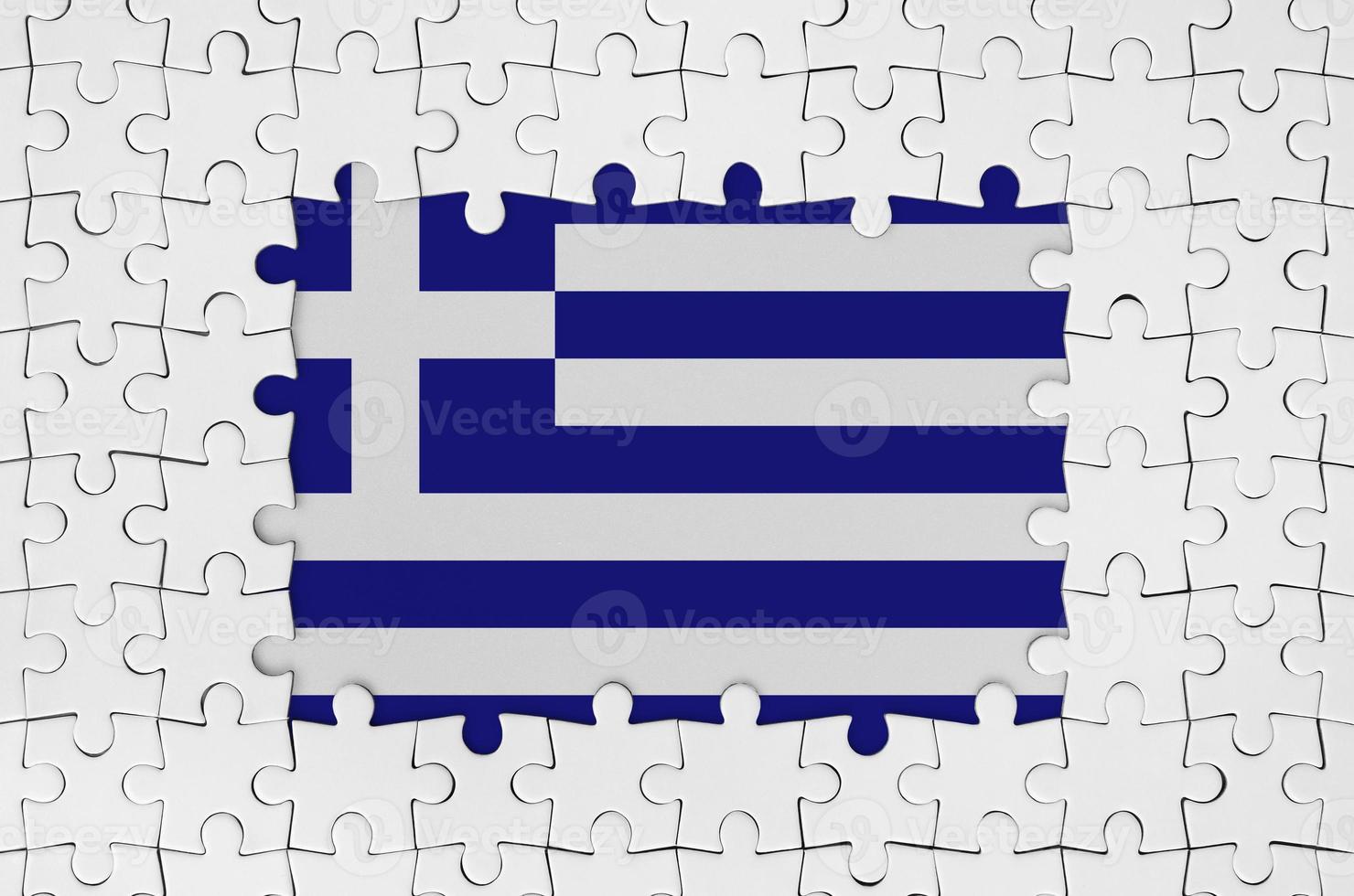 Greece flag in frame of white puzzle pieces with missing central part photo