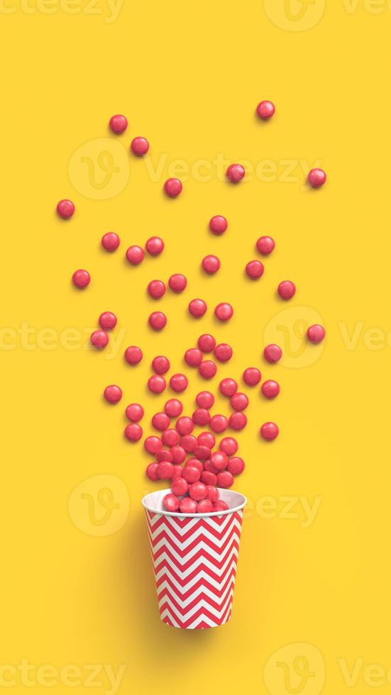 Red coated chocolate candies scattered out of the paper cup with red zigzag pattern on yellow background. 3d rendering. photo