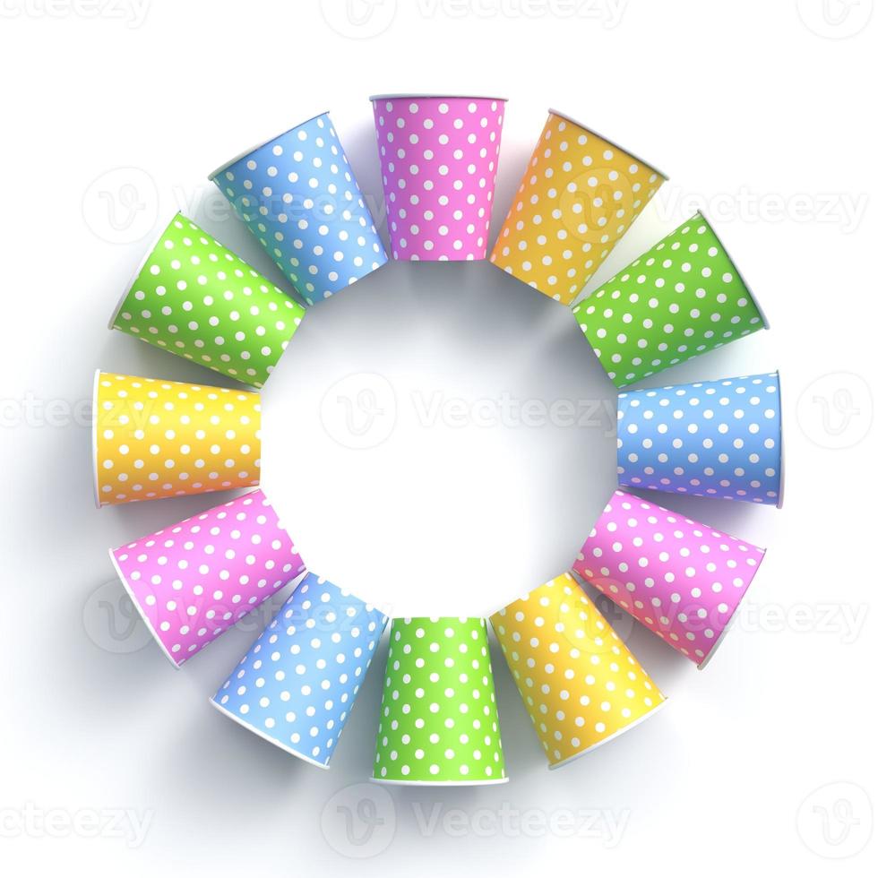 Colorful paper cups with polka dot pattern arranged in circle frame photo