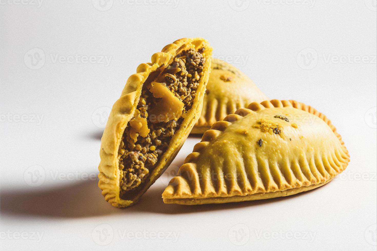 Bring a touch of sophistication to your food-related projects with our Empanadas on a white background. Showcase the rich flavors and diversity of Latin American cuisine photo