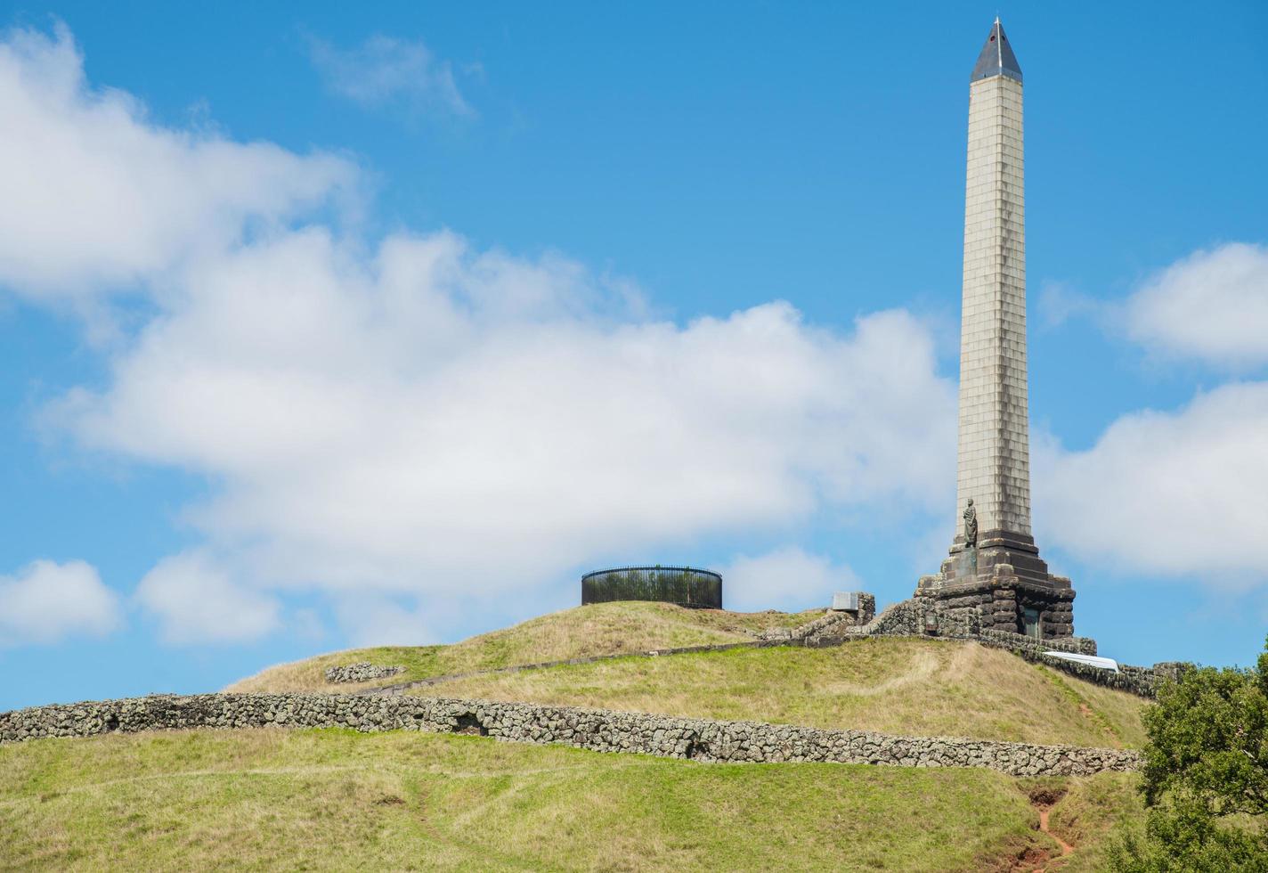 The Obelisk monument on the top of One Tree Hill in Auckland, New Zealand. photo