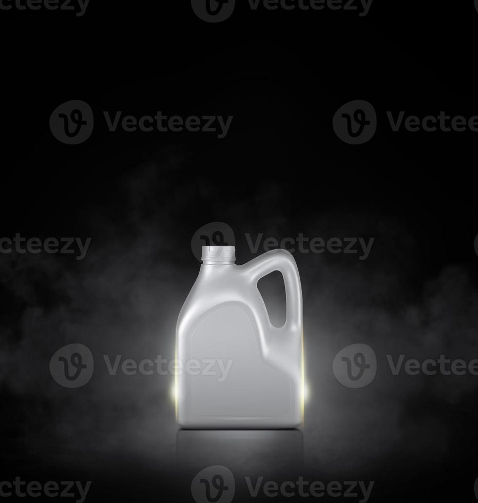 Grey bottle of engine oil on black background with smoke photo
