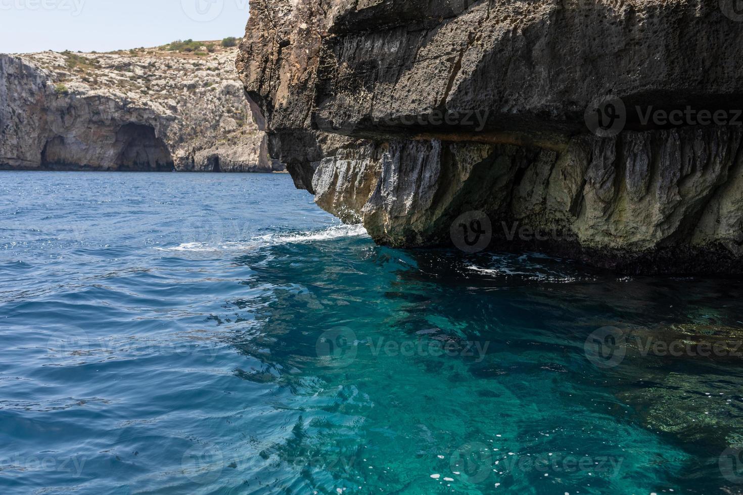 beautiful view of the rock in the sea in Malta. water of turquoise and blue photo