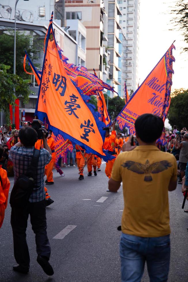 Ho Chi Minh city, Vietnam - 6 Feb 2023 Lunar New Year celebration - The dragon dance, beautiful colorful festive figure. Tet holiday background. Chinese Lunar New Year's Day, Spring Festival. photo