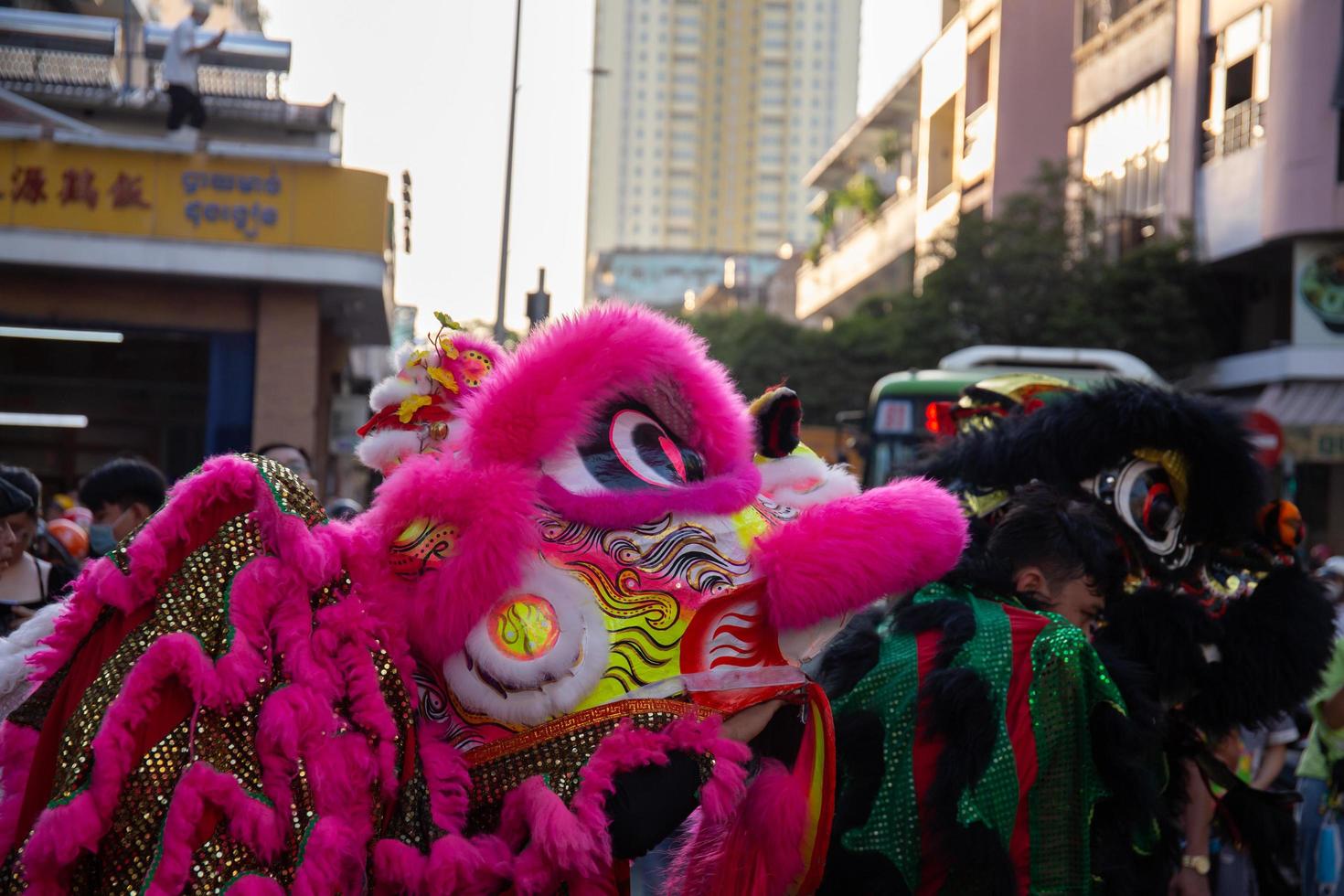 Ho Chi Minh city, Vietnam - 6 Feb 2023 Lunar New Year celebration - The dragon dance, beautiful colorful festive figure. Tet holiday background. Chinese Lunar New Year's Day, Spring Festival. photo