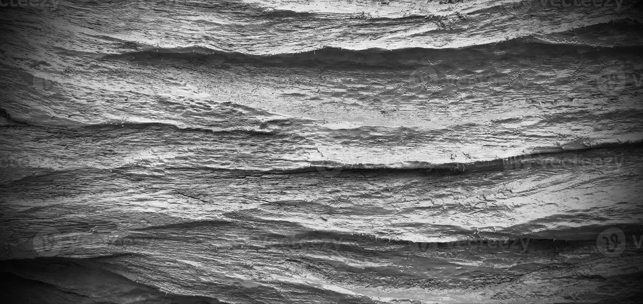 black and white writing on wooden wave board dark frame, with art design retro style concept. photo