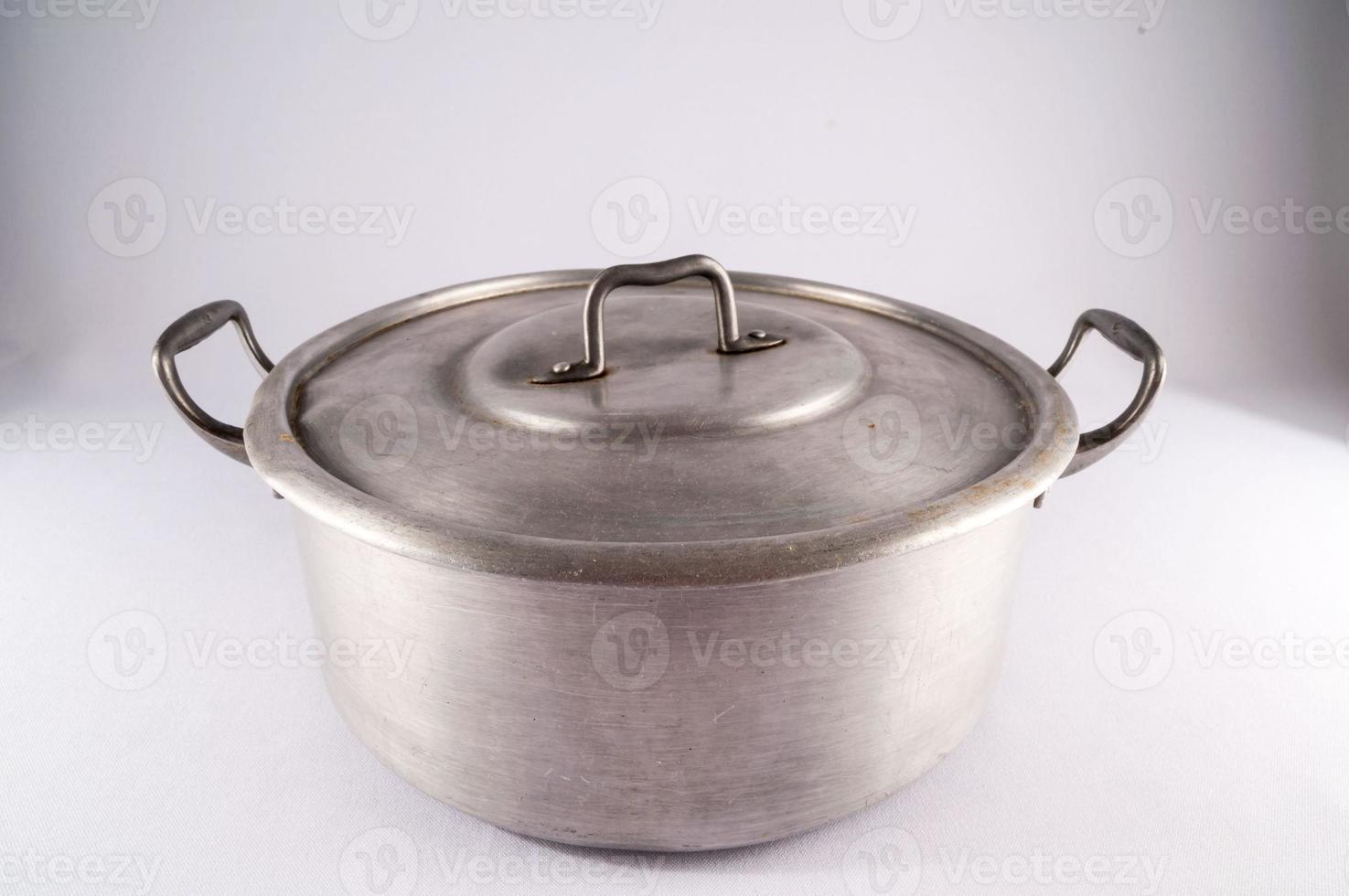 Cooking pot on light background photo