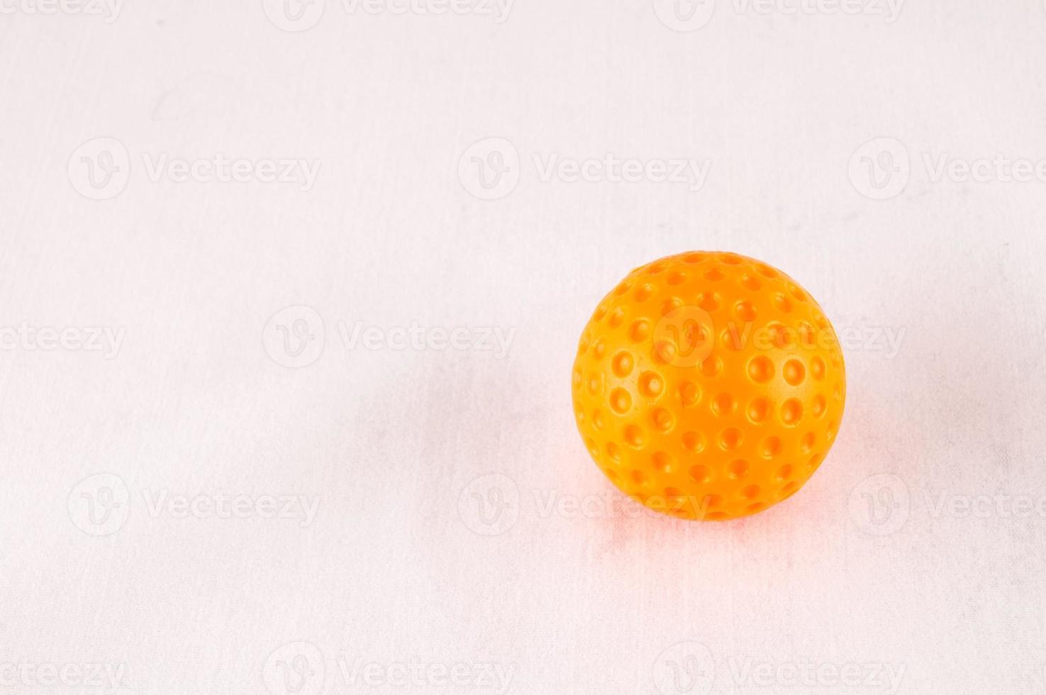 Orange golf ball photo