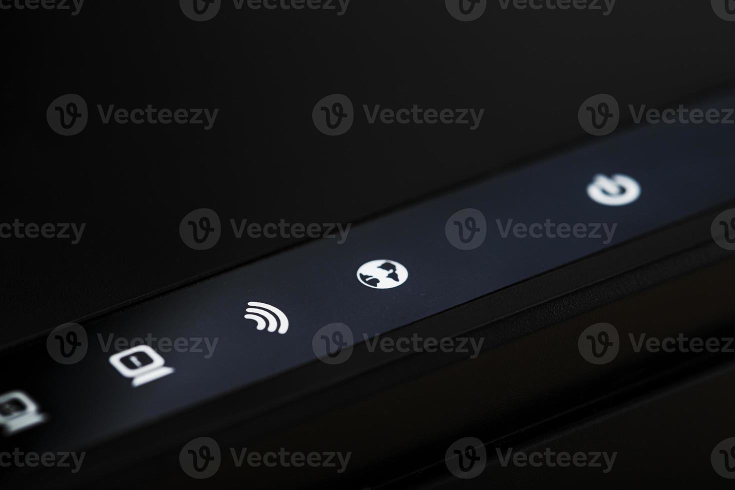 The icons on the Wi-Fi router are close-up, indicating the signal and connection. photo