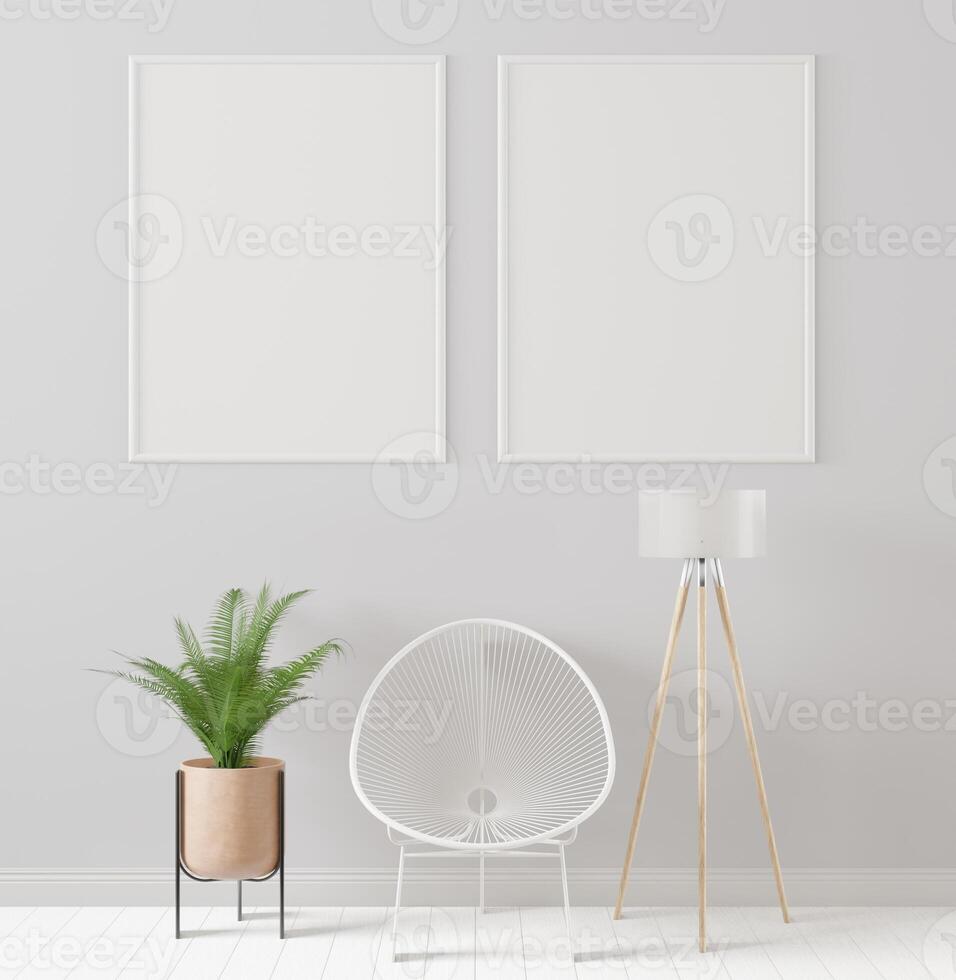 Picture frame attached to the wall, with chairs and vases placed on the table. photo