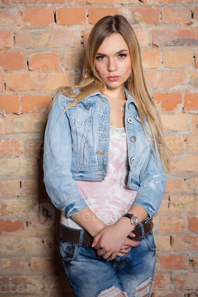 Portrait of pretty woman posing standing photo