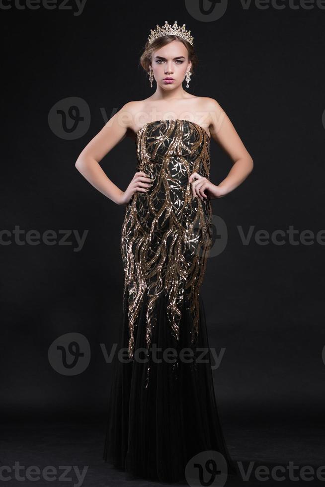 Young alluring woman posing in studio photo