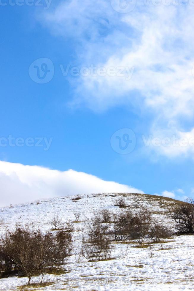 Hill covered with snow. photo
