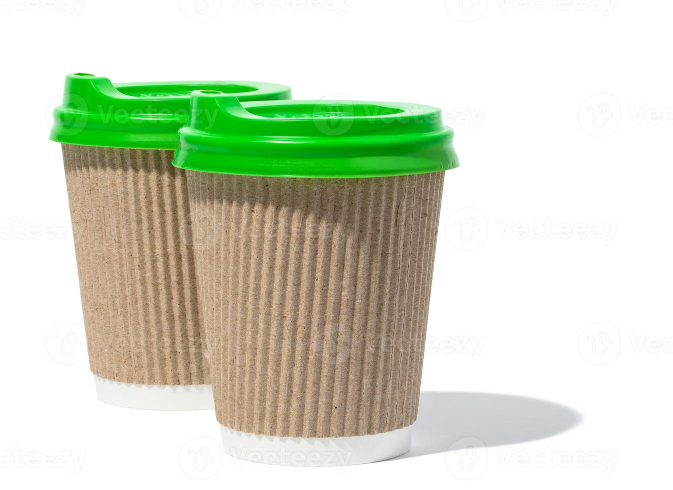 Empty brown paper disposable cups on a white background, concept eco-friendly, zero waste photo