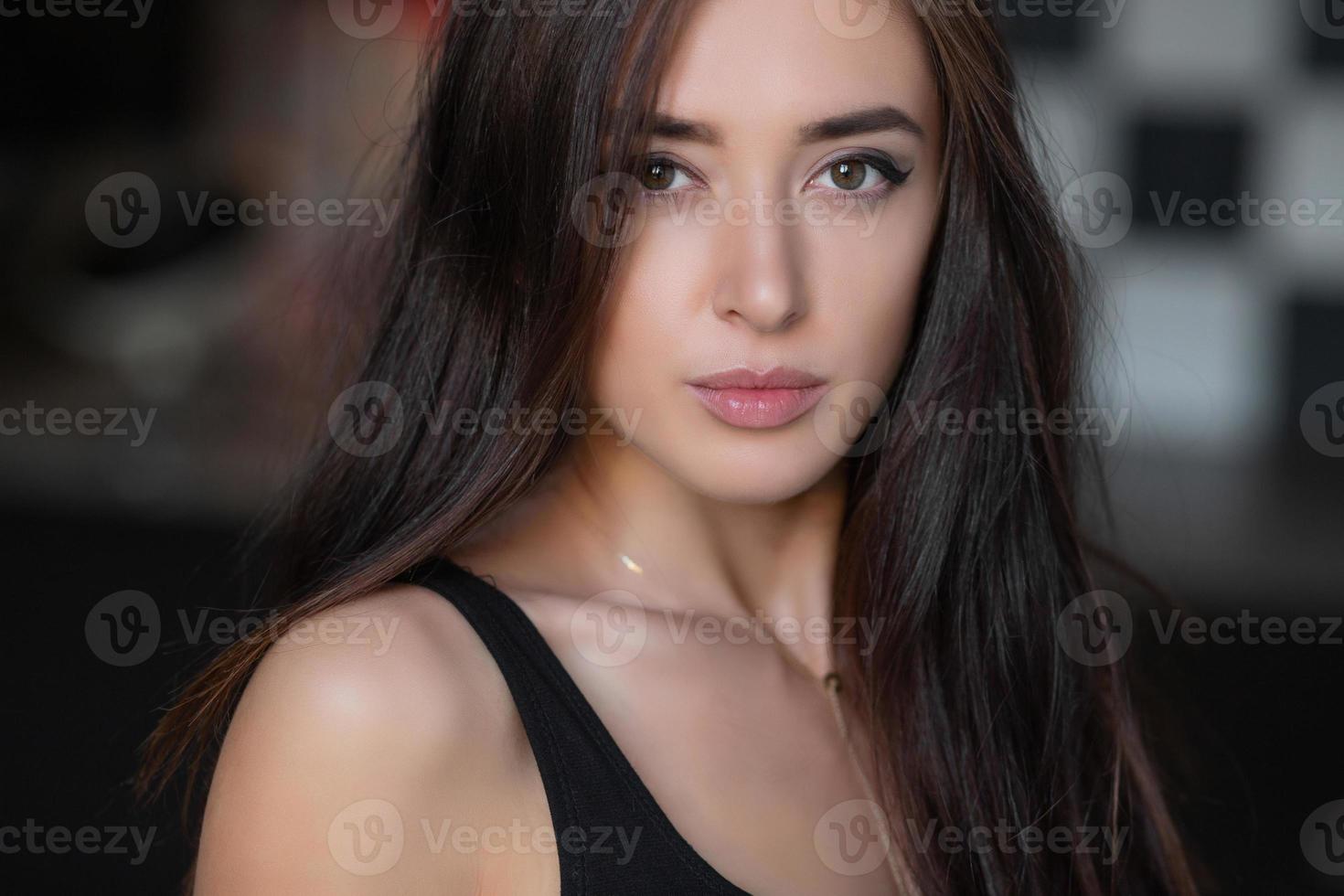 Portrait of a beautiful young brunette photo