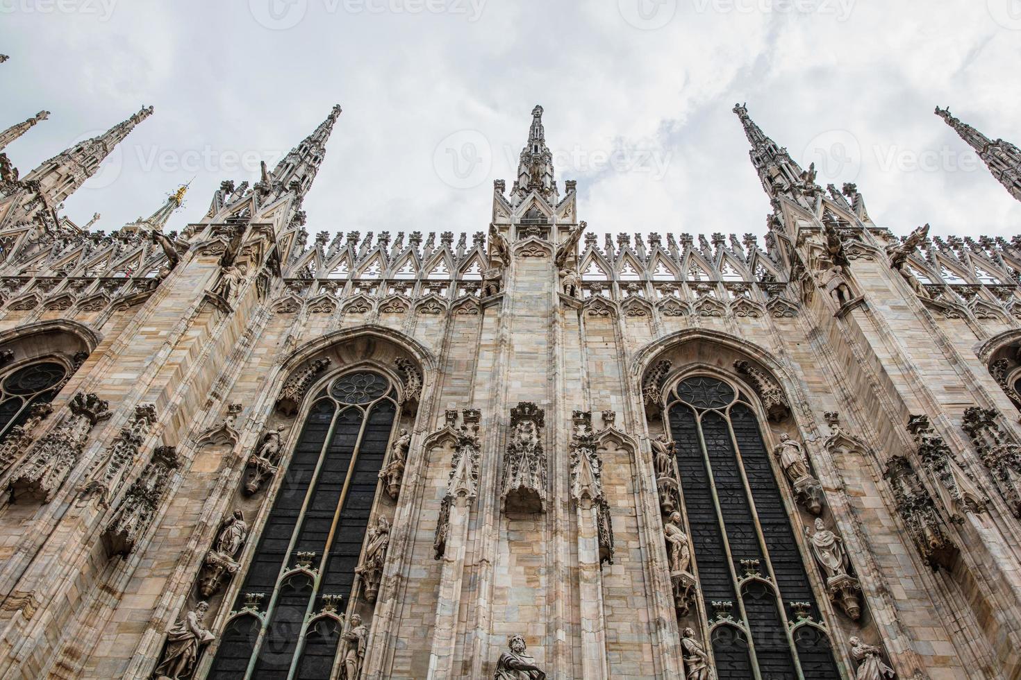 Bottom view of the spiers of Milan Cathedral photo