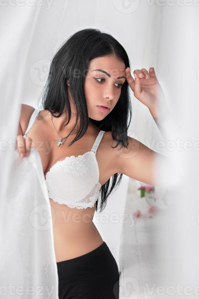 Beautiful young brunette with tattoo photo