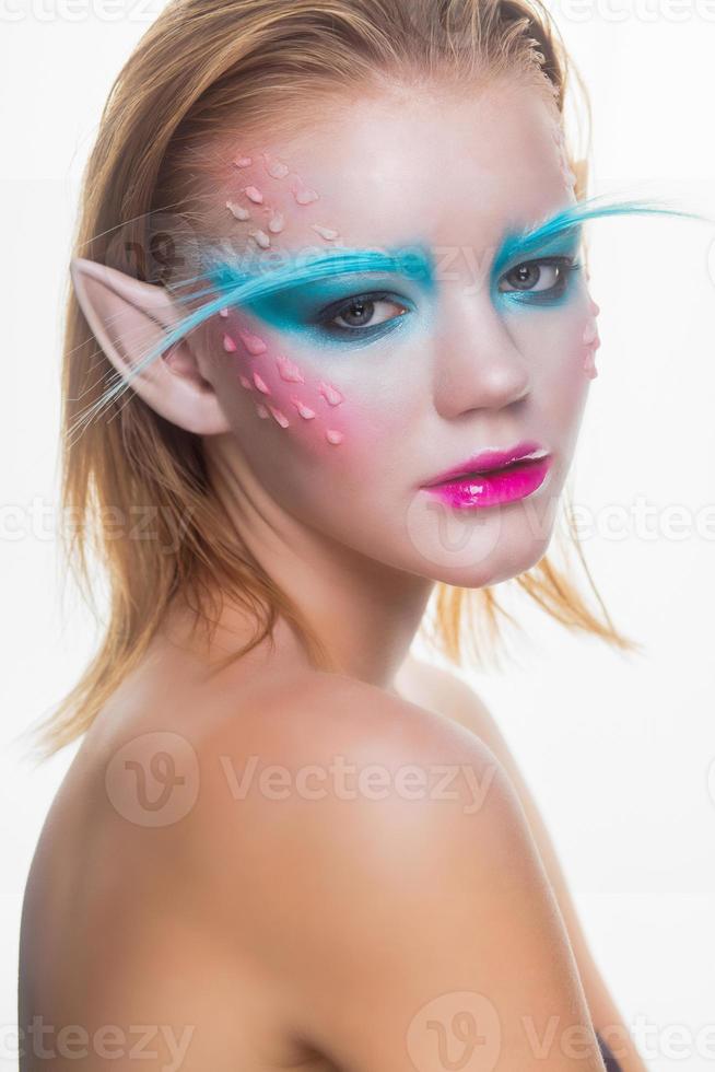 Nice blonde in the image of an elf photo