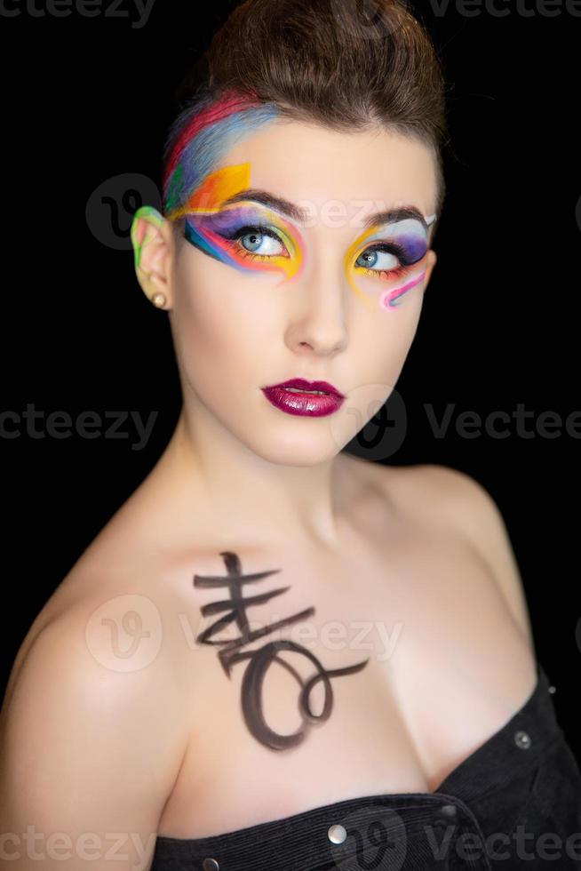 Young lovely woman with creative make up photo