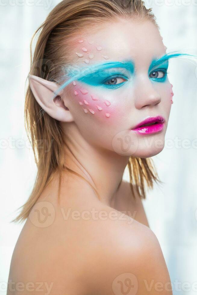 Nice blonde in the image of an elf photo