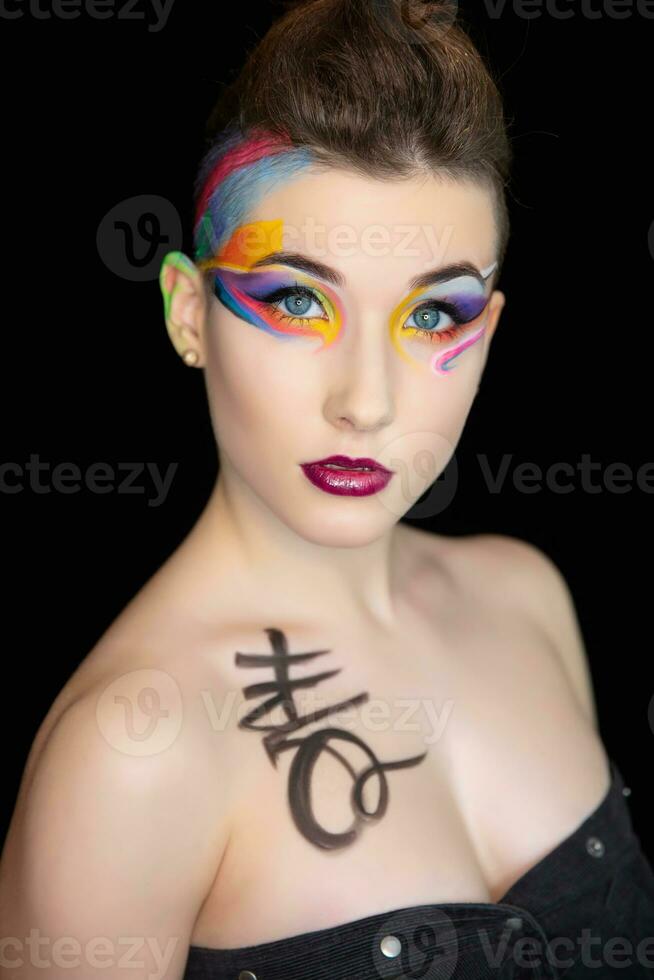 Young attractive woman with creative make up photo