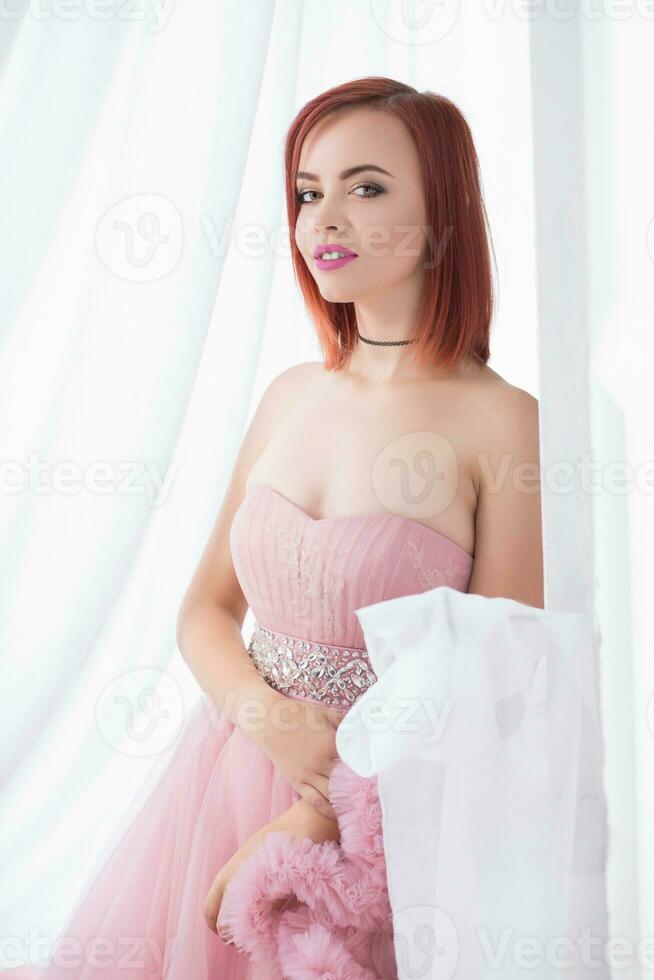 Portrait of a lovely young redhead woman photo
