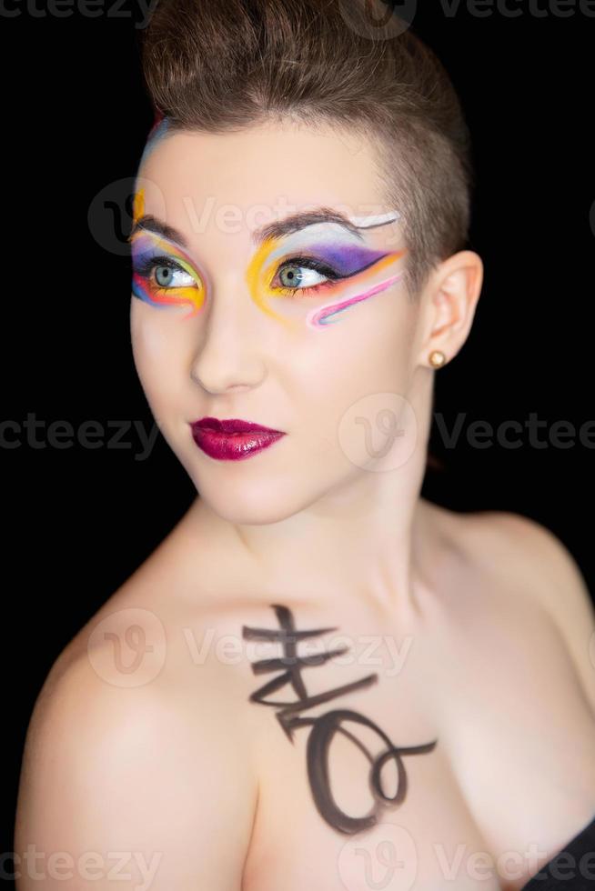 Young adorable woman with creative make up photo