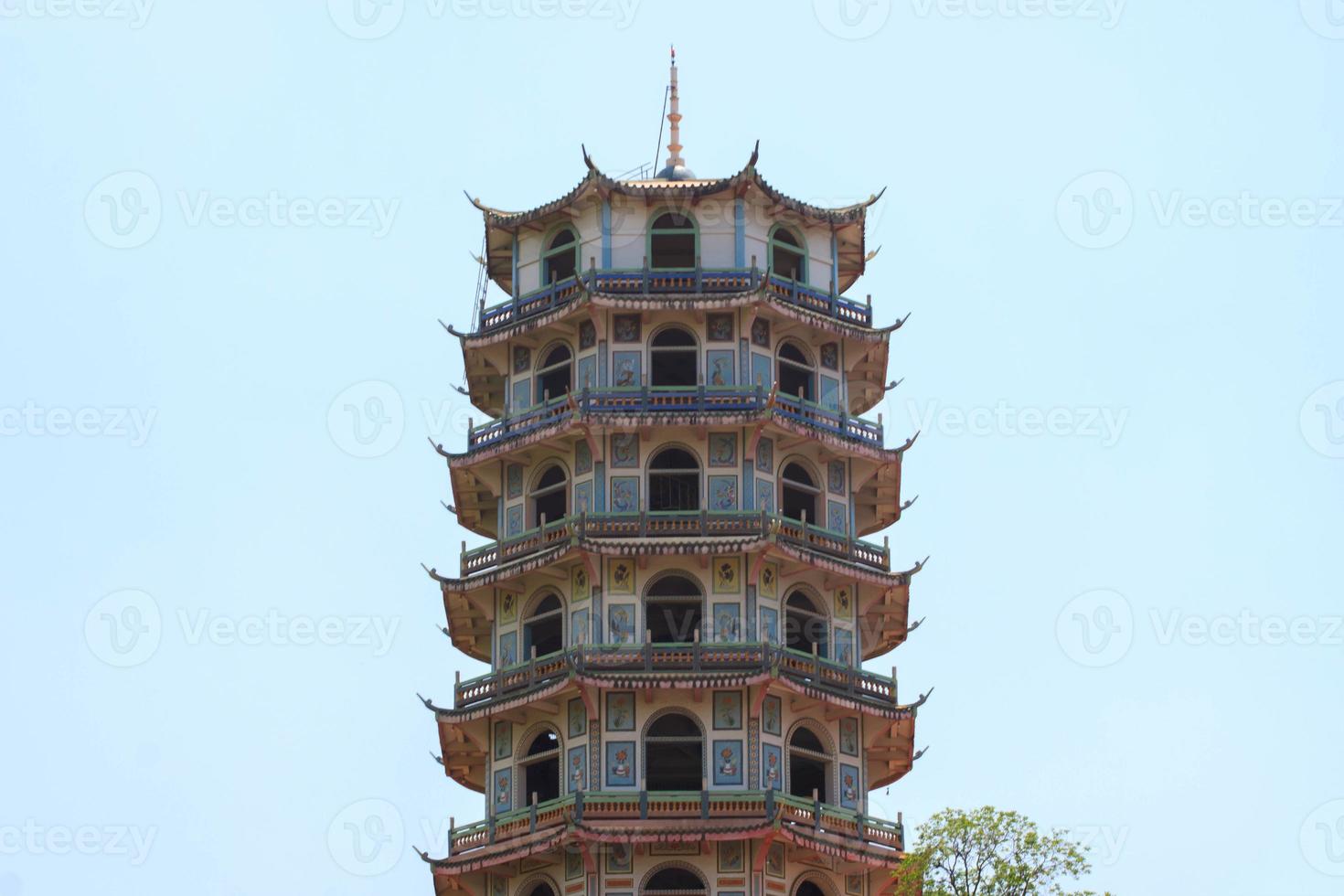 Building a 9-storey Chinese canopy is a Chinese art created by skilled and skilled craftsmen in Chinese temples and is a tourist attraction for tourists in rural Thailand. photo