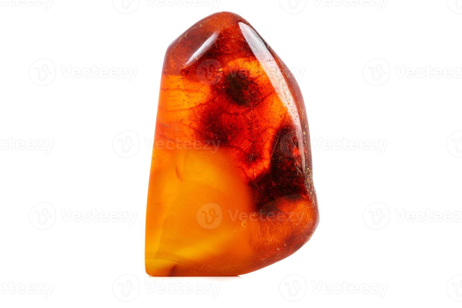 Macro Amber mineral stone on white background photo