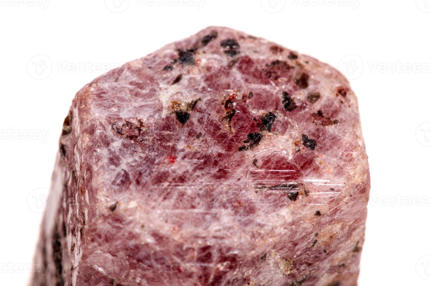 Macro mineral stone Ruby in the breed a white background photo