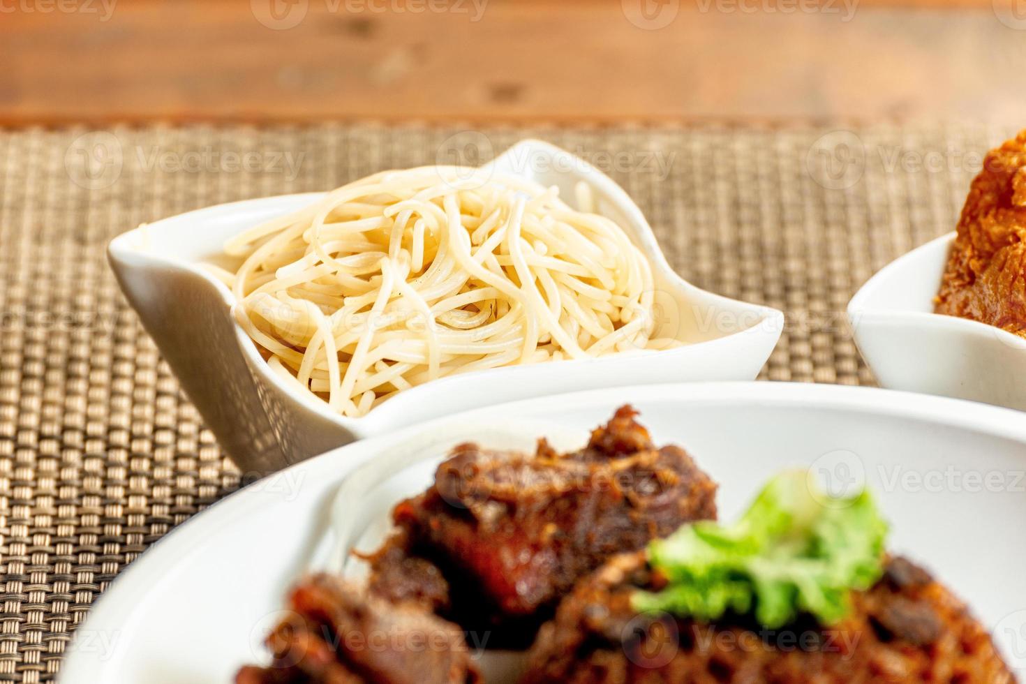 jollof rice with meat - vegetable and fruits photo