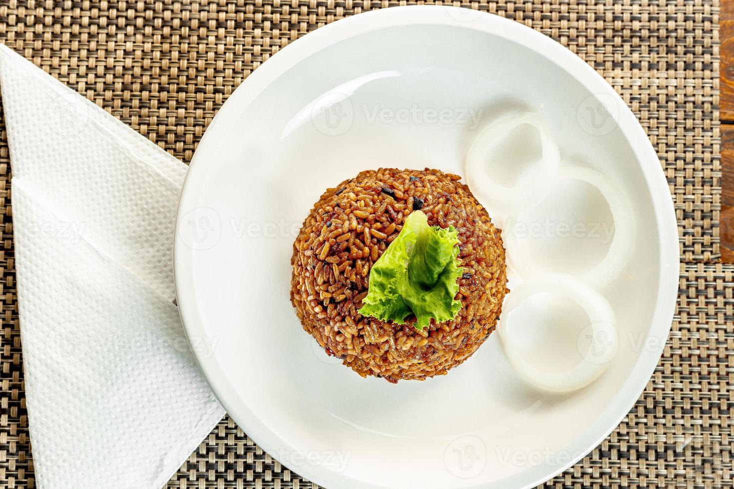 jollof rice with mean - vegetable and fruits photo