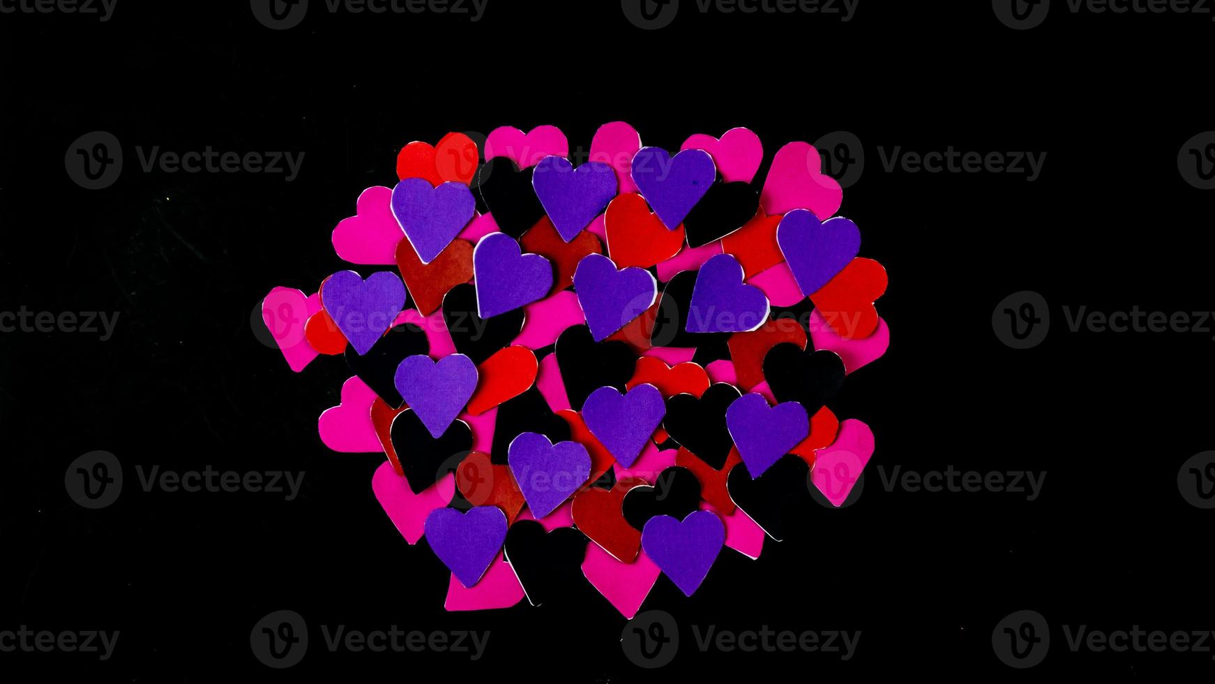 multicolored heart on black background for valentine's day photo