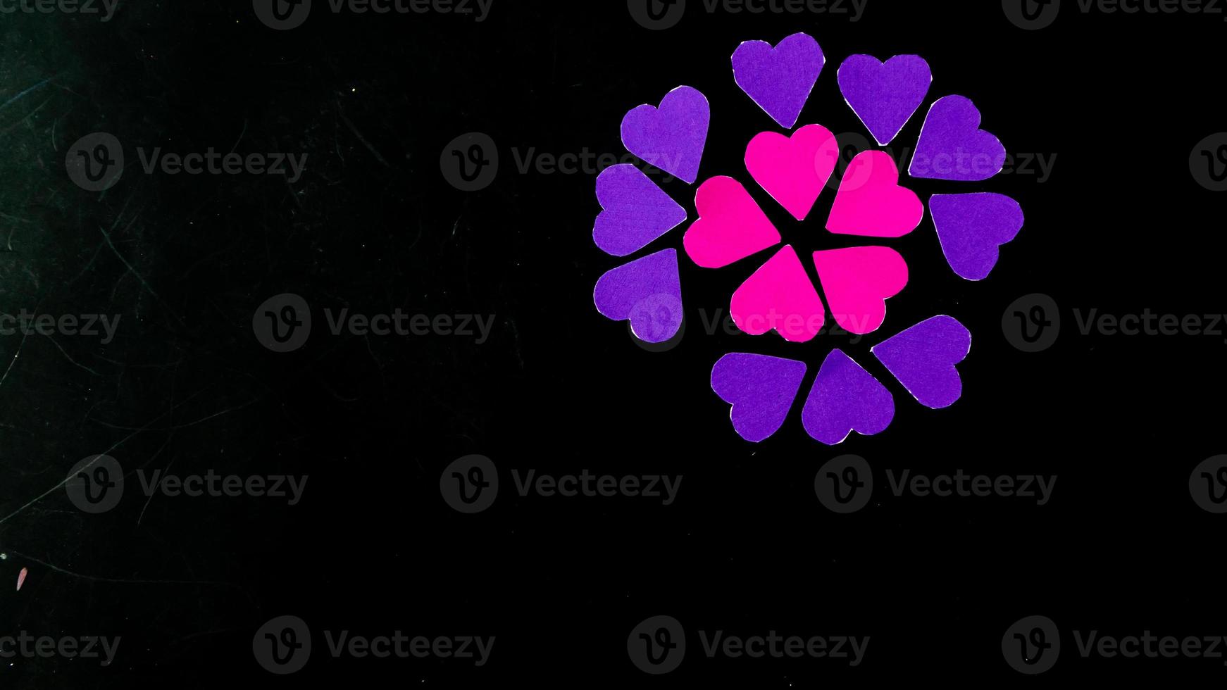 multicolored heart on black background for valentine's day photo