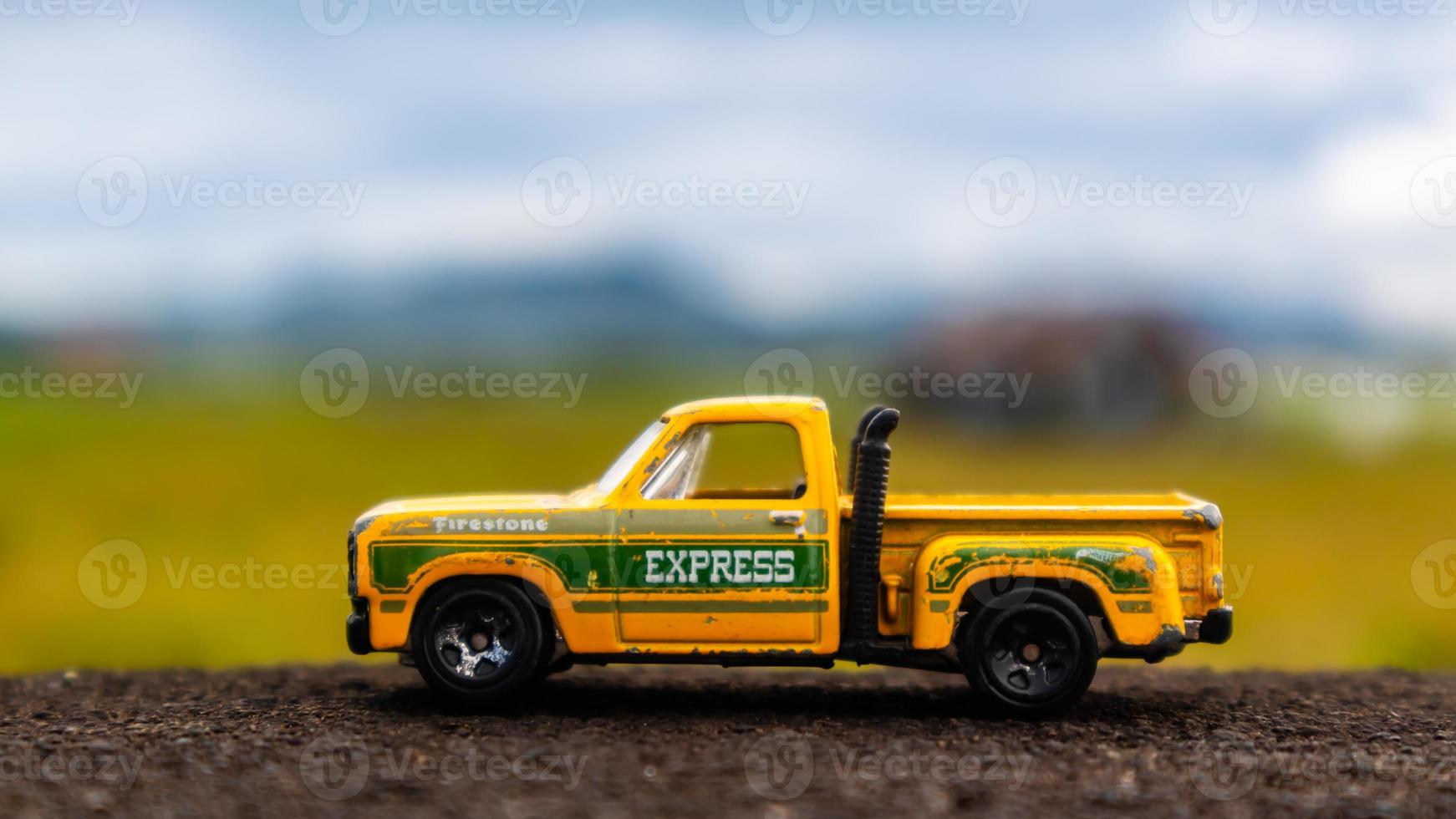 minahasa, Indonesia  January 2023, toy car in the rice field photo