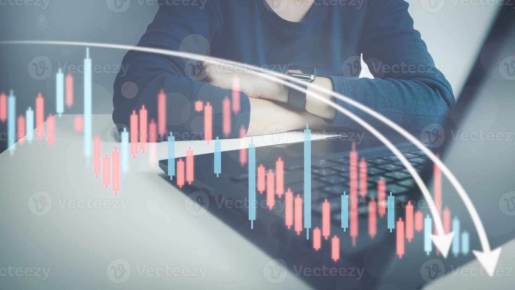 Investor analyze stock chart with laptop, businessman forecast and analysis graph in Bearish downtrend, economic slowdown, inflation crisis, loan interest rise, trade war finance, covid-19 impact. photo