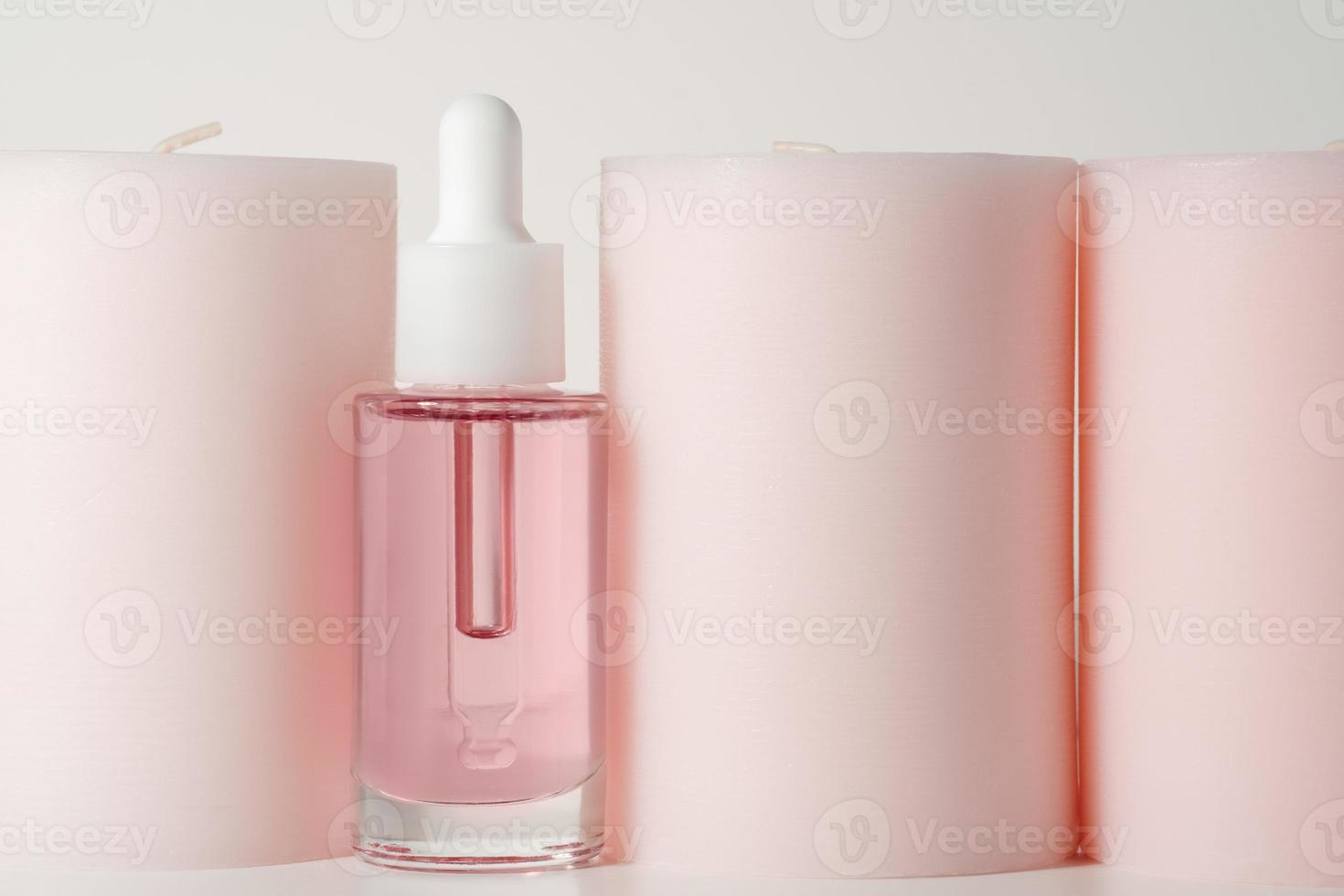 pink face oil and candles photo
