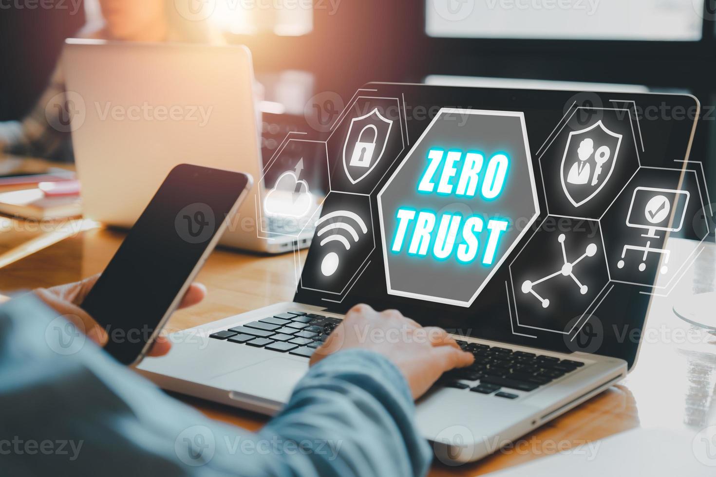 zero trust security concept, Person using computer with zero trust icon on virtual screen. photo