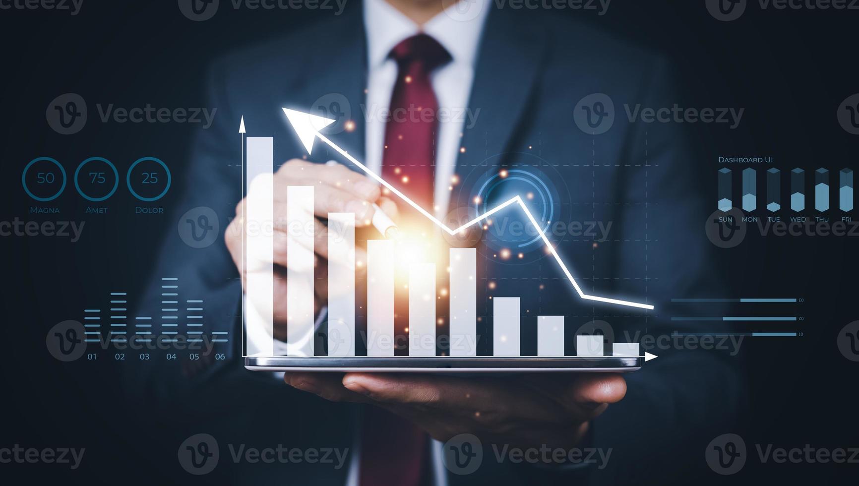 Businessman holding tablet bar graph of analytics and financial, Changes in new planning, Business growth, ideas and perspectives, Stock investment, and dividends yield from business in the new year photo