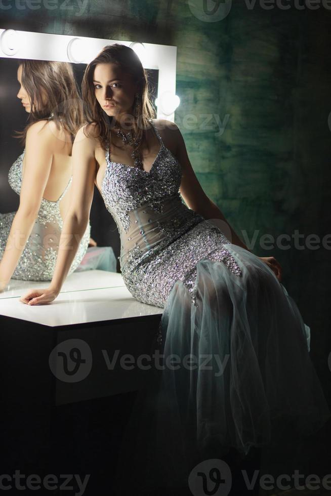 Alluring brunette posing in a studio photo