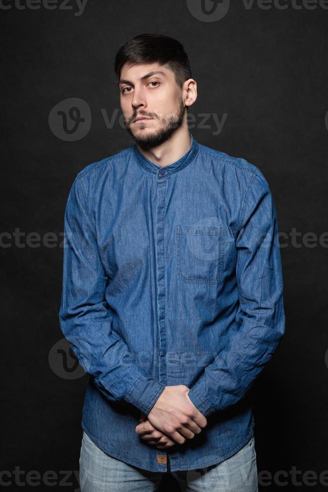 Attractive man posing in studio photo