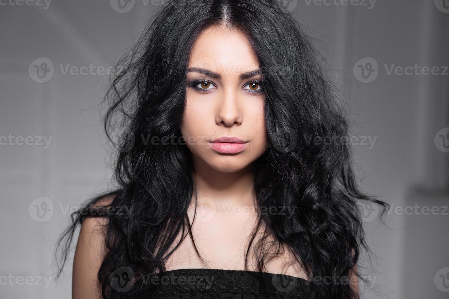 Portrait of a pensive young lady photo