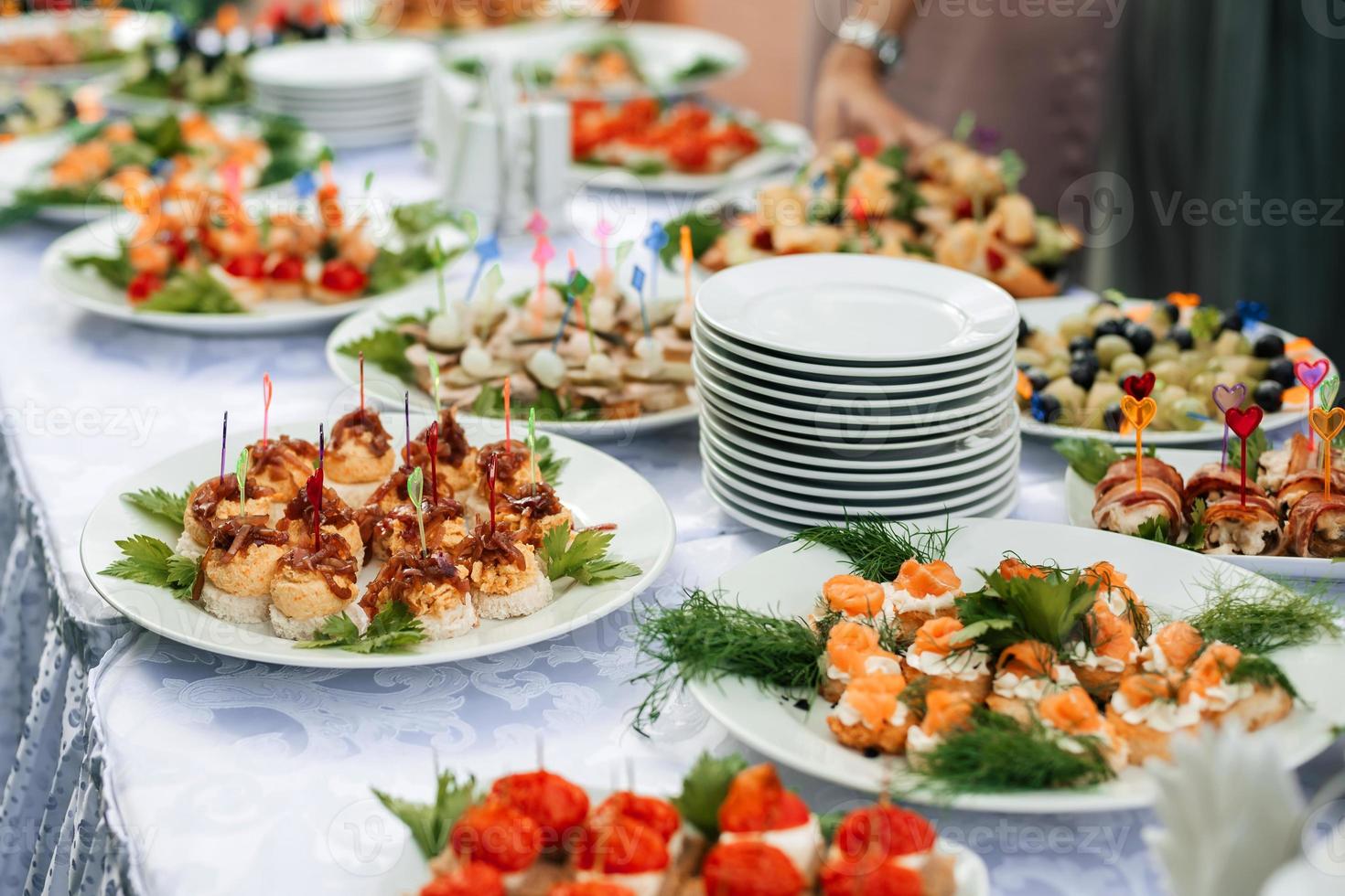 light snacks, canapes on a festive table photo