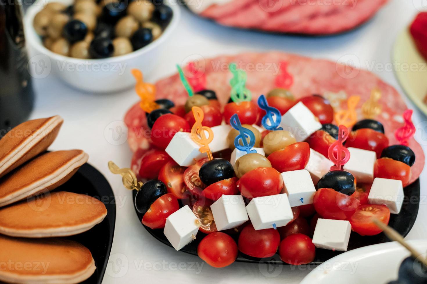 light snacks, canapes on a festive table photo